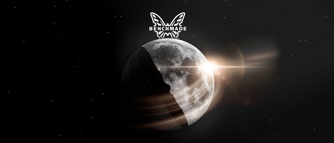 Benchmade logo crowns a glowing moon against deep space, evoking adventure and bold exploration.