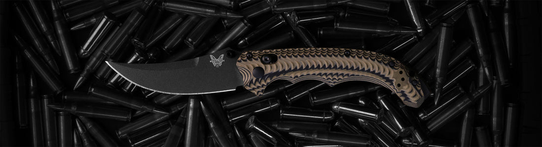Benchmade knife with tan micarta scales rests on black casings, previewing a bold 2025 tactical gear release.