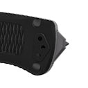 Black textured back spacer with mounting holes, side view.