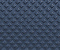 Close-up of dark blue textured surface with a repeating raised diamond pattern, likely a component detail.