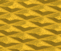 Golden textured surface with a repeating diamond pattern and embossed details.