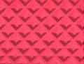 Bright pink CSTM component with a repeating dark chevron pattern, shown in a close-up view.